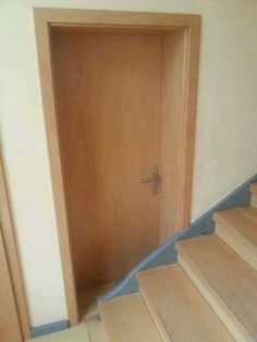 an open door leading to a set of stairs