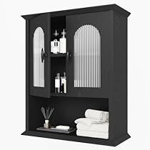 a black cabinet with white towels and other items