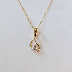 This is an exquisite diamond pendant set in 14K Solid Gold. An elegant design, perfect for regular wear featuring close set sparkling diamonds. ITEM DETAILS: ✓ Gold Kt: 14K Yellow Gold ✓ Gold Weight: 0.88 grams  ✓ Pendant Size: 12x8mm ✓ Diamond Shape/ Cut: Round Brilliant ✓ Diamond weight: 0.10 carats ✓ Diamond No.: 4 Natural Diamonds ✓ Diamond Color: I-J ✓ Diamond Clarity: SI >>The Gold purity is guaranteed and it comes with authentic 14K gold hallmark. >>Jewlery Report provided as well certifi