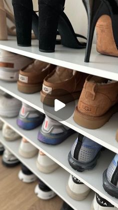 there are many pairs of shoes on the shelves