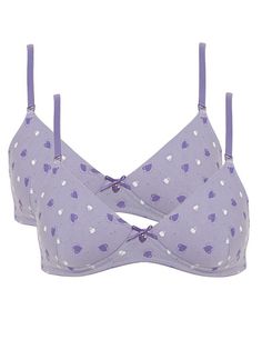 *US/UK Sizing A pretty design and a fun choice for growing girls. The Purple Heart set is a two-pack containing two purple heart print bras. Both bras are lightly padded for shape and modesty and have a purple heart charm detail at the center front. With Teen Pra 2-Pack Purple Hearts Bras- 8025, growing girls can have both style and comfort. The bras feature a pretty, purple heart print design and are lightly padded for shaping and modesty. To top it off, the center front is adorned with a charming purple heart detail. It's the perfect choice for fashion-forward girls. First Bra, Bra Fitting Guide, White Bra, Purple Hearts, Printed Bras, Hearts Girl, Purple Girls, White Bras, Pretty Purple