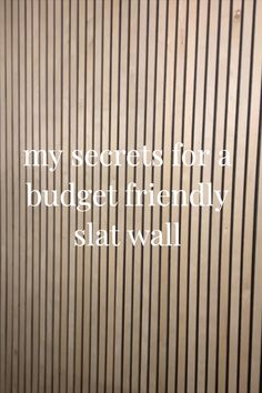 there is a quote on the wall that says, my secrets for a budget friendly slatt wall