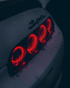 a close up of a car's tail light