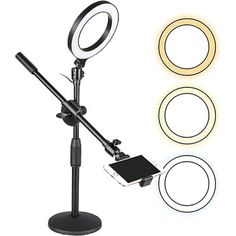 Introducing the ultimate ring light with stand and phone holder- the best Android and iPhone stand for video recording. Crafted from premium carbon steel and ABS materials, this ring light kit is perfect for all your video recording, live streaming, portrait photography, and makeup needs. With a high-quality 6-inch ring light, a 360-degree adjustable shooting arm, and an extendable C-clamp holder, this ring light kit produces soft, uniform light that can be adjustable in both brightness and colo Overhead Selfie, Circle Lights, Ring Light Tripod, Led Selfie Ring Light, Ring Lights, Phone Lighting, Dynamic Lighting, Selfie Ring Light, Circle Light