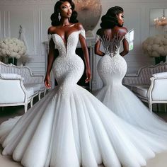 two women in white dresses standing next to each other, one is wearing an off the shoulder