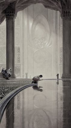 a man kneeling down on the ground in front of a building with columns and pillars