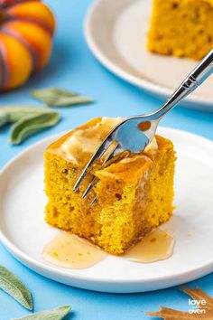 a fork is stuck into a piece of pumpkin cake