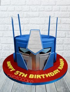 a birthday cake made to look like a robot from the movie's tv series