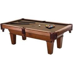 a pool table with two cues and one ball resting on the top, in front of a white background