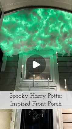 a green sky filled with clouds is shown above the front door to a house that says spooky harry potter inspired front porch