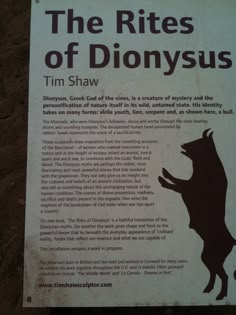 a sign on the side of a building that says, the rites of dionyus tim shaw