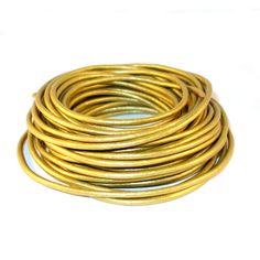 gold colored coils on a white background