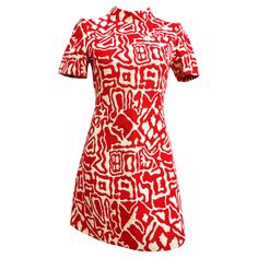 Ted Lapidus trapeze dress from the early 1970s in braided wool with abstract/brutalist motifs in fiery red on a white background. Short sleeves and structured shoulders. Long back zipper ending in 3 small mother-of-pearl buttons. Size 42 shown corresponds to a size 36, please refer to measurements. Shoulder 34cm Chest width 42 Waist 36cm Length 83cm Please note: a defect under the waistband on the front of the dress, the knit is slightly worn (but can be repaired) (see photo). The Red Jumpsuit Apparatus Poster, Red 1970s Style Summer Dress, 1930s Red Dress, Jean Paul Gaultier Red Dress, Ted Lapidus, Dresses Aesthetic, 1920 Fashion, Trapeze Dress, Fiery Red