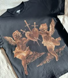 an old t - shirt with angels on it