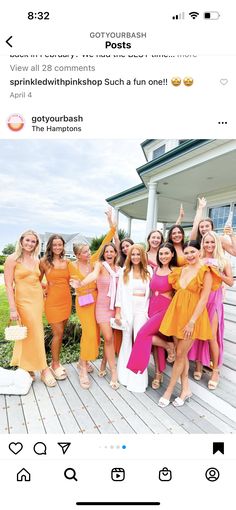 a group of women standing on top of a wooden floor in front of a house