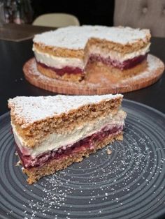 two pieces of cake sitting on top of a plate