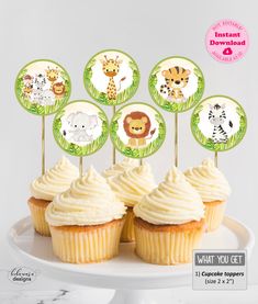 cupcake toppers with jungle animals on them