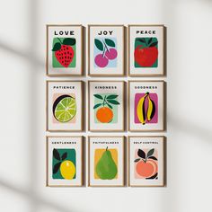 the four cards have fruit on them in different shapes and sizes, including apples, oranges, pears, lemons