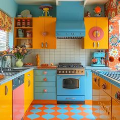 a colorful kitchen with orange, blue and yellow cabinets