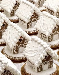 some very pretty decorated gingerbread houses on display