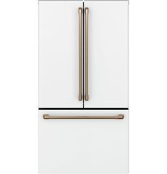 a white refrigerator freezer with two gold handles