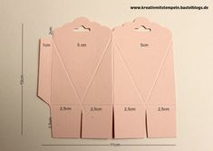 three pieces of pink paper are shown with measurements