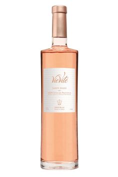 a bottle of pink wine on a white background