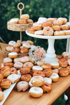 there are many different types of donuts on the table