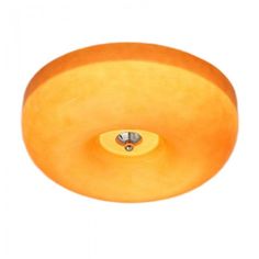 an orange ceiling light on a white background