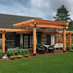 a patio with an attached pergolan and seating area in front of the house