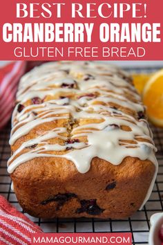 a loaf of cranberry orange glaze bread on a cooling rack