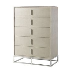 a white dresser with four drawers and two metal legs on the bottom, against a white background