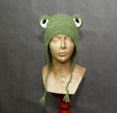 Alpaca beanie hat, Knit hat, Froggy hat, Winter hat gift for women, Animal hat birthday gift for a friend, Animal lover gift. More animal hats you can find here: https://etsy.me/3B4ySGh This lovely frog hat might be the perfect gift for your animal-lover friends. This beanie hat is hand-knitted. It's made of very soft yarn - blow yarn, made of baby alpaca wool with the addition of polyamide. Adding polyamide to the yarns makes them more durable, and the knitted fabrics hold their shape better.  The hat is soft and warm. It will protect you before the winter chill. Color: green, dark green, blue-green, yellow, and coral - colors of tree frogs :) Because of different monitors and screen resolutions, color may look different on the screen than in reality. If you want such a hat in any other c Cute Knitted Cap Beanie, Winter Yarn Hats As Gifts, Winter Yarn Hat As Gift, Adjustable Knitted Winter Costume Hats And Headpieces, Adjustable Knitted Costume Hats And Headpieces For Winter, Handmade Playful Winter Bonnet, Playful Handmade Winter Bonnet, Quirky Beanie For Winter, Quirky Beanie Hat For Winter