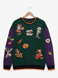 Celebrate Halloween with Mickey and Friends in this crewneck! Featuring color blocked sleeves  this sweater shows off an allover puff print design of Mickey and his pals in Halloween costumes among various spooky icons across the front and back—perfect for any occasion.A BoxLunch Exclusive!60% cotton; 40% recycled polyesterListed in unisex sizesWash cold with like colors; dry lowDo not iron over printImported Spooky Icons, Disney Outfits Women, Halloween Color, Mickey Mouse Halloween, Culture Clothing, Color Block Sweatshirt, Puff Print, Mickey Mouse And Friends, Disney Merchandise