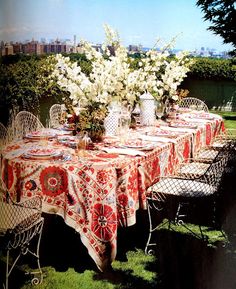 the table is covered with red and white cloths