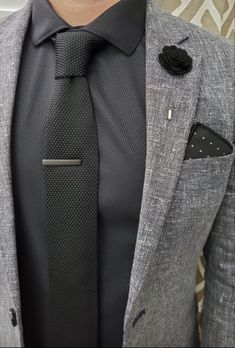 Man wearing a great suit with all black shirt and accessories Grey Tie Outfit Men, Black And Gray Suit Men, Men’s Dark Grey Suit, Black Shirt And Tie Outfit Men, Tie For Grey Suit, Charcoal Suit With Black Shirt, Black Suits For Men Classy, Light Grey Suit Outfit Men, Gray Suit With Black Shirt