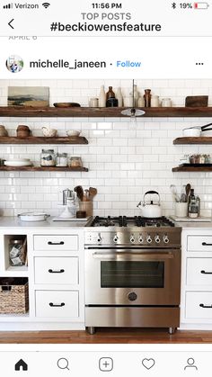 a stove top oven sitting inside of a kitchen next to shelves filled with pots and pans