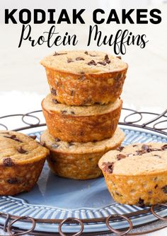 several muffins stacked on top of each other with text overlay that reads kodiak cakes protein muffins