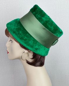 Bright green fur felt hat.  Bucket style with the deep crown and flaring brim.   Crown is wrapped in a wide moss green sating hatband with a large back button Excellent condition. No maker's label. Size tag is 22.  Inner circumference is 21 inches.  Crown rise is 4 inches, front brim extends 2 1/2 inches and back is 1 1/2 inches. Alley Cats Vintage is a Member of the VFG. Novelty Green Hats With Curved Brim, Novelty Green Hat With Curved Brim, Vintage Green Hat With Short Brim, Vintage Wide Brim Green Hat, Vintage Adjustable Fur Felt Hat, Alley Cats, Green Fur, Alley Cat, Felt Hat