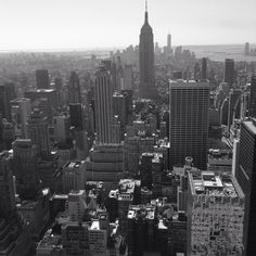 black and white photograph of new york city from the top of the empire state building