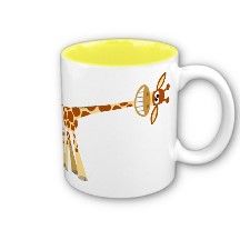 a white coffee mug with a giraffe on it's side and a yellow rim