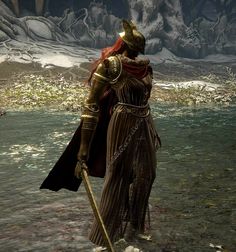 a woman dressed in armor and holding a staff stands in the middle of a body of water