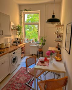 the kitchen is clean and ready to be used for cooking or dining room purposess