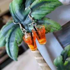 Orange Drink With Lemon Slices Dangle Earrings. Super Fun & Cute Dangle Earrings Made To Look Like Mini Drink Cups With Little Black Straw In Each Cup. Orange Drink With Lemon Slices At Bottom. Brand New In Original Packaging. These Resin Drink Earrings Are Made Of Eco-Friendly Acrylic Material, Non-Toxic And Safe, Durable And Lightweight. Measures About 1.65" Bundle To Save! Fun Orange Earrings For A Gift, Fun Orange Earrings For Gift, Fun Orange Earrings For Gifts, Fun Orange Dangle Earrings, Drink Earrings, Heart Ear Cuff, Cute Nickel-free Orange Earrings, Cute Dangle Earrings, Orange Drink