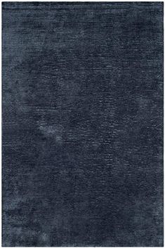 an area rug with dark blue colors