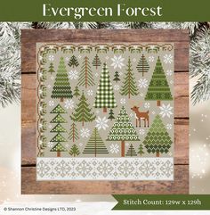 the evergreen forest cross stitch pattern is shown