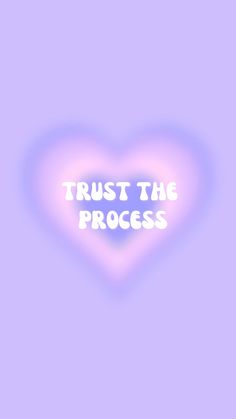 a heart with the words trust the process written on it in white letters against a purple background