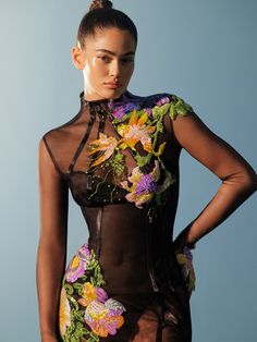 Multi-colored tropical fantasy rainforest foliage characterizes this high-neck, long-sleeved sheer "Iris" gown, accentuating her multiple princess-cut seams. Fantasy Rainforest, Rainforest Foliage, Galia Lahav Bridal, Veil Accessories, Black Evening Gown, Sheer Gown, Galia Lahav, Fashion Gowns, Tropical Foliage