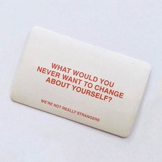 a white sticker with red writing that says, what would you never want to change about yourself?