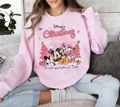 Disneyland Christmas Sweatshirt, Disneyland Sweatshirt, Christmas Family Shirt, Mickey and Minnie Friends Christmas Sweatshirt, Gift For Her ✔ Follow these steps to place an order and ensure the right color, size, and description: * Choose the desired size and color from the dropdown menu. * If customization is available, check the personalization box and provide the requested information. * Select the quantity and add the item to your cart. * Proceed to checkout and choose your preferred shippi Magic Kingdom Christmas, Disneyland Sweatshirt, Disneyland Christmas, Mouse Pictures, Very Merry Christmas Party, Christmas Party Shirts, Friends Christmas, Family Christmas Shirts, Friend Christmas